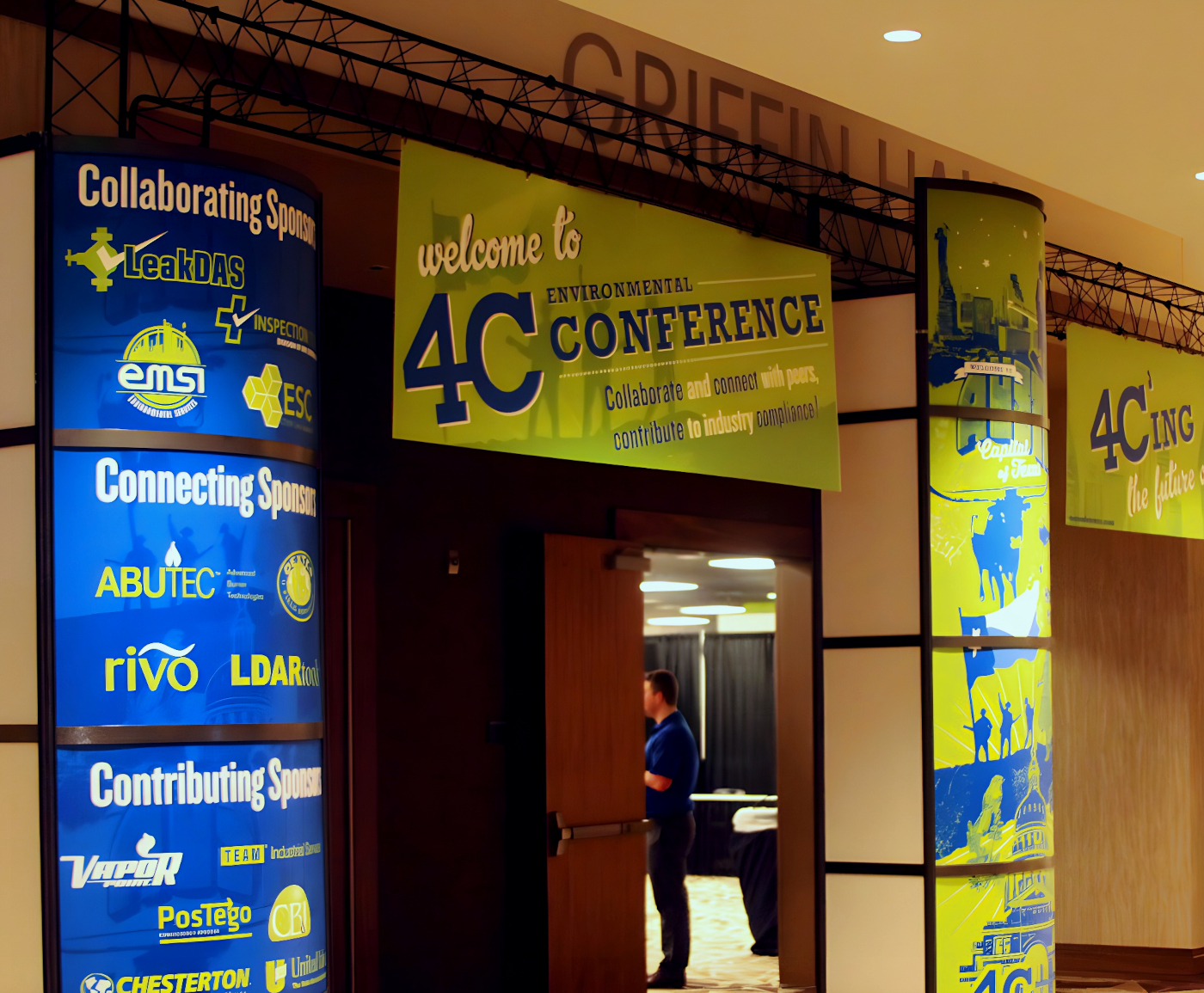 A photo of some of the archway signage that people walked under to get to event rooms.