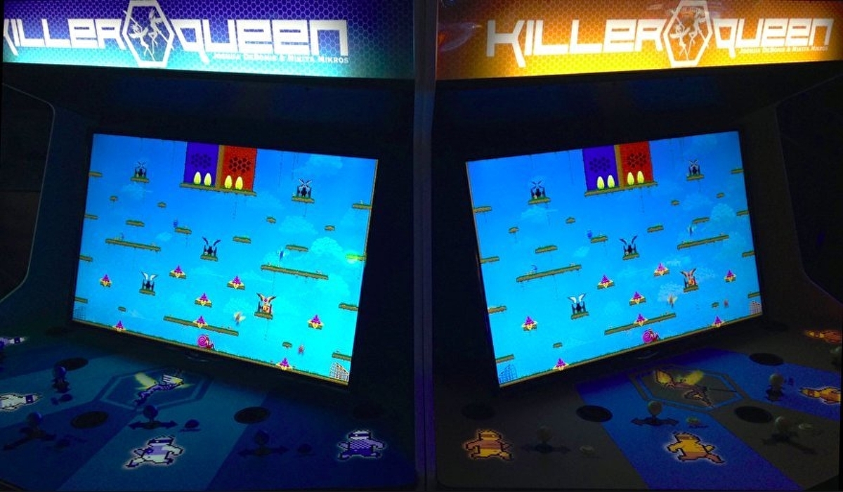 An image of the videogame cabinet for Killer Queen, a popular competitive arcade game released by Josh DeBonis and Nikita Mikros in 2013.